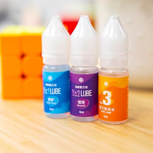 Three pieces of ten milliliter professional cubing lubricants lined up