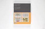 Stacked view of the book alongside design tools for scale reference