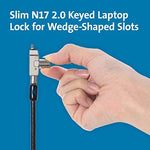 Slim profile locking head attached to a laptop wedge security slot