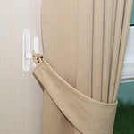 Child safety window cord wrap holding a blind cord