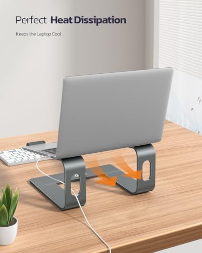 Anti-slip silicone rubber pads on premium grey notebook stand close up view.