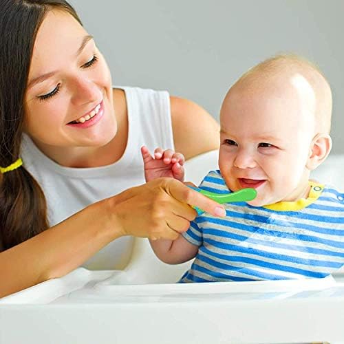 Brightly colored orange blue pink and green baby toothbrushes for toddlers