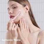 Woman using Tinkle Everglow razor for eyebrow shaping