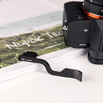 JJC mirrorless camera stability thumb grip showing secure fit in multi interface shoe