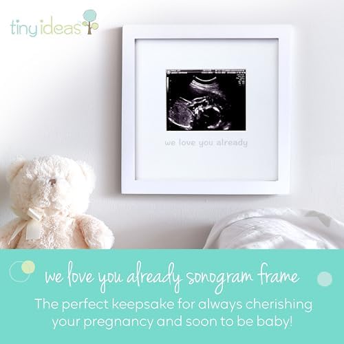 Tiny Ideas pregnancy announcement frame with teal script lettering displaying a four by five inch sonogram photo.