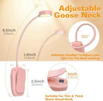 KTEBO 10 LED reading lamp clipped onto a paperback book demonstrating its eye caring glow in a dark room