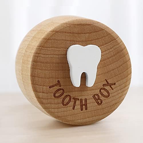 Close up of 3D carved tooth icon on wooden box lid