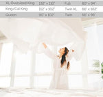 Authentic imported Southshore Fine Living California King top sheet neatly arranged in a modern bedroom configuration.