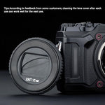 Side view of JJC slim profile rotating lens cap attached to an Olympus Tough action camera setup.