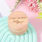 Close up of leaf engravings on wooden baby box