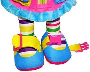 Toddler playing with June Garden Dressy Friends educational plush doll