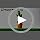 Detailed view of the button control on the cactus toy base