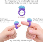 Assorted sensory spinner rings in pink purple green and white colors for kids and teens.