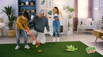 Child playing with Goliath Gator Golf flamingo putter and alligator