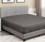 Grey queen size fitted sheet on a comfortable mattress