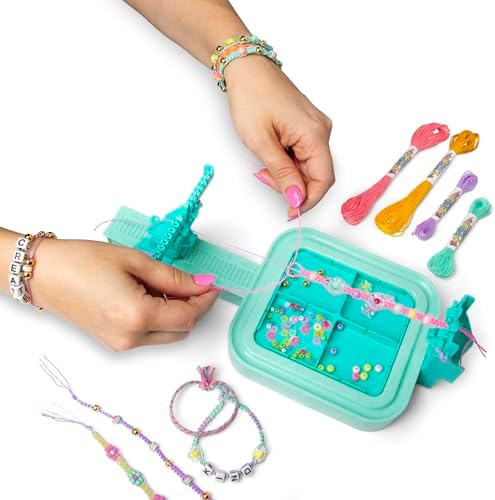 Close-up of hands-on crafting activity demonstrating how to thread pastel beads and tie knots on the loom.