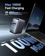Imokin four port GaN laptop power adapter with foldable prongs tucked inside