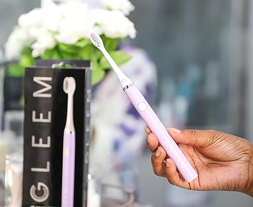 Gleem lavender sonic electric toothbrush showing the soft round bristle head