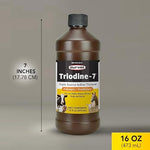 Durvet Triodine-7 antiseptic solution bottle held for scale
