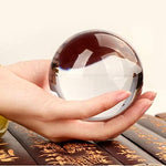 DSJUGGLING 80mm clear acrylic contact juggling ball front view showing transparent optical grade sphere