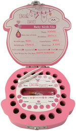 PAMBO wooden milk teeth storage box showing the secure metal locking mechanism detail