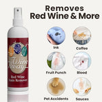 Wine Away bottle being used on a red wine spill on white carpet