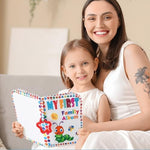 Fullhawl toddler plush memory gift book attached to a stroller bar via the plastic teether ring hook.