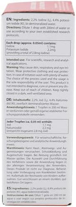Heiltropfen iodine solution bottle beside its protective cardboard tube