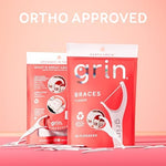 Close up of Grin braces flosser pick and thin filament