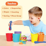 Close up of child using tongs with Skillmatics sorting toy