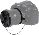 Two pieces of fifty eight millimeter black plastic lens protective caps