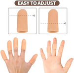 Elastic finger support gloves being worn to relieve hand arthritis pain while typing.