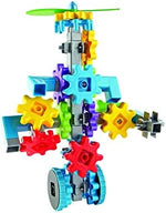 Children playing with colorful interlocking gears and propeller