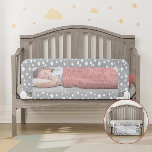 NUTIKAS toddler bed rails convertible safety side protector attached to a wooden crib frame.