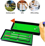 Three golf club shaped pens with different ink colors