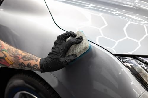 Premium DIY ceramic car detailing bundle components laid out for paint preparation and application