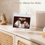 Mlatnod baby sonogram display book showing open calendar style pages with three by four inch picture
