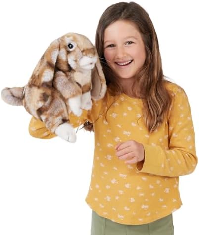 Close up of the silky texture and realistic eyes of the Folkmanis bunny puppet