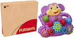 Toddler playing with colorful interchangeable plastic gears