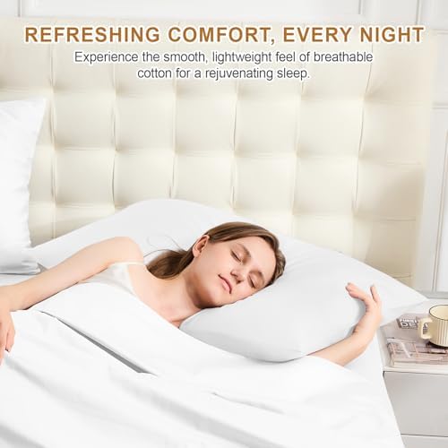 Soft breathable pure cotton white flat sheet arranged elegantly over a Queen size bed setup.