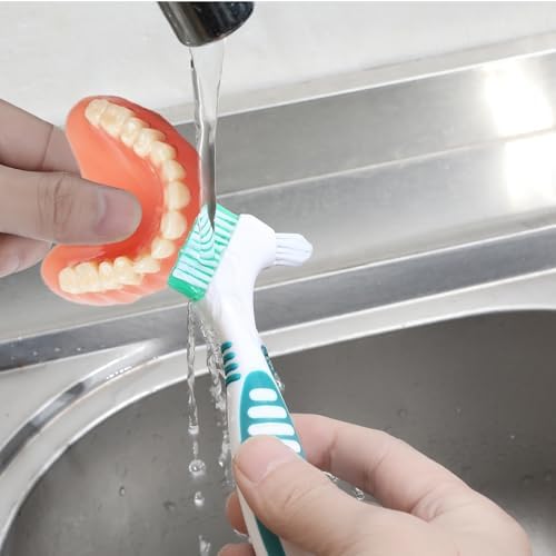 Tucnoeu false teeth cleaning brushes placed neatly inside the white portable storage case