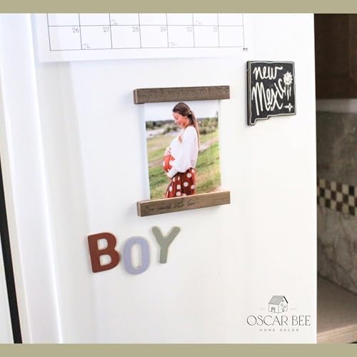 Oscar Bee premium vertical baby ultrasound frame placed elegantly on a modern home shelf