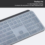 Washable and reusable clear computer accessory skin being rinsed under tap water