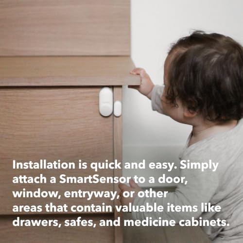 Ecobee home security contact sensors mounted cleanly onto a white residential window frame.