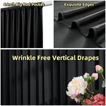 Four panels of thick black polyester photo backdrop drapes hanging on a stand
