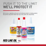 Red Line synthetic grease jar next to automotive maintenance tools
