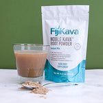 FijiKava stress relief supplement pouch alongside a glass of prepared kava drink