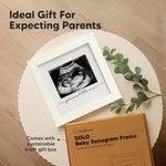 Back view of the KeaBabies baby announcement photo frame showing the sawtooth hanger and easel stand.