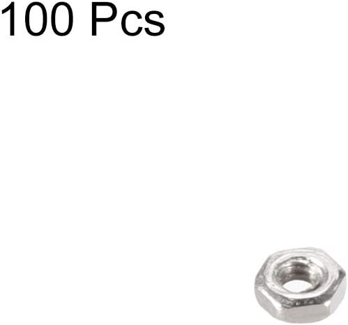 Close up shot of hexagonal metal nuts showing thread pitch