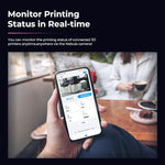 Smart monitoring camera set up beside a 3D printer bed capturing real time layering.